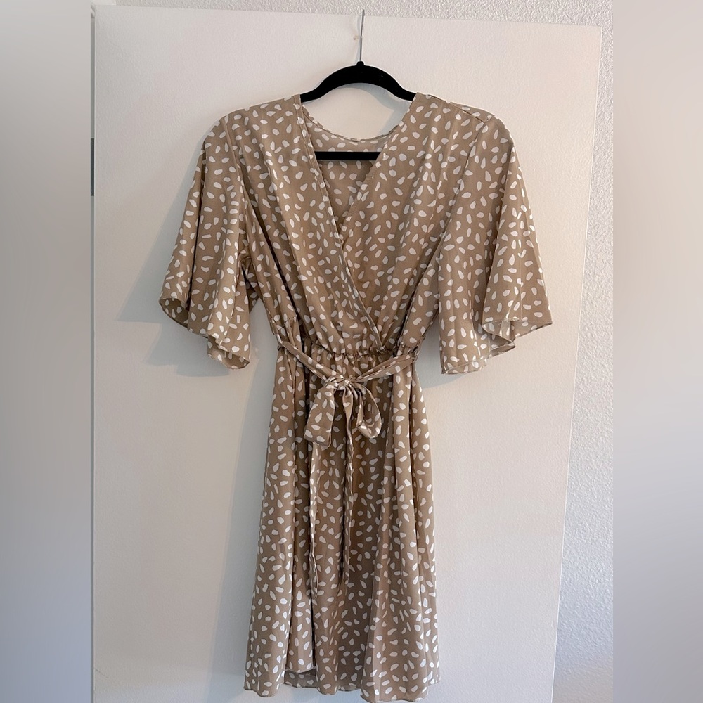 Women’s tan and white polka dot wrap dress
